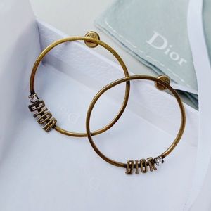 Authentic Vintage Dior Diamond Hoops